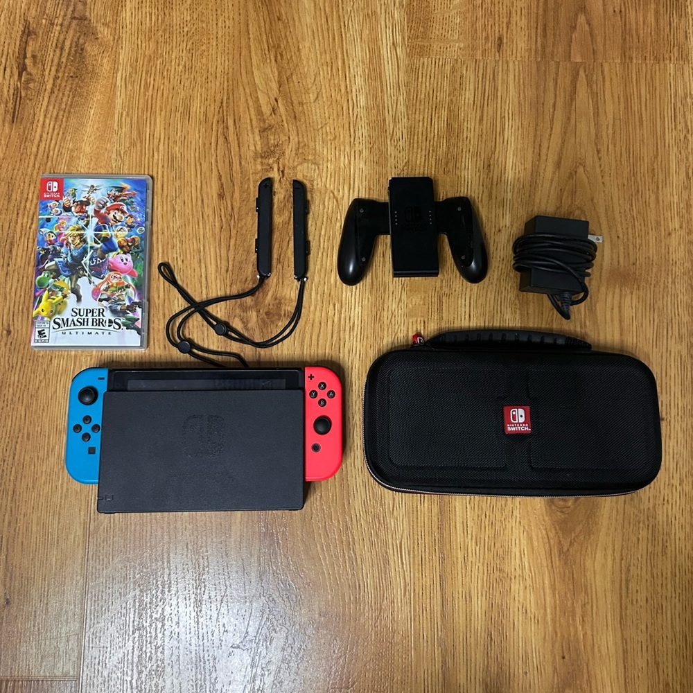 Nintendo Switch Console with Red and Blue Controllers